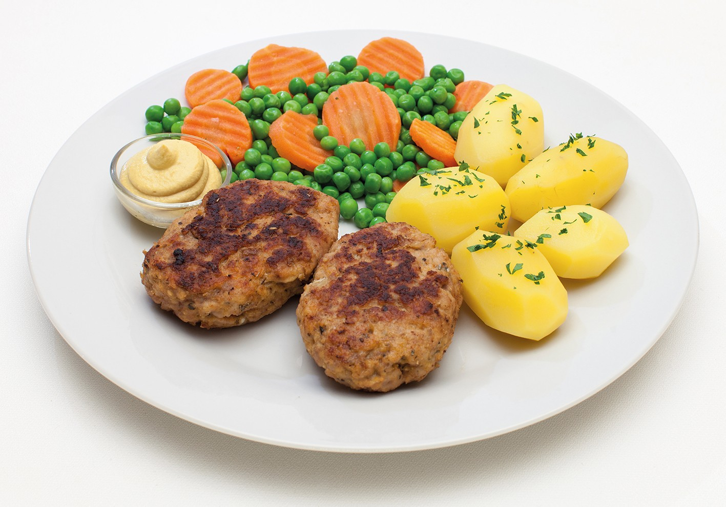 Frikadelle mit Gemüse und Kartoffeln